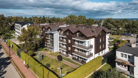 Jasny Brzeg, Sun & Snow Отели рядом с достопримечательностью «Albatros»