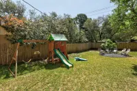 Spacious Backyard with Outdoor Play Area - Inviting Family Retreat Hotels in Jollyville