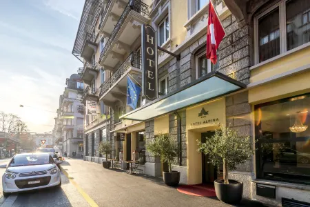 Hotel Alpina Luzern Отели в г. Люцерн