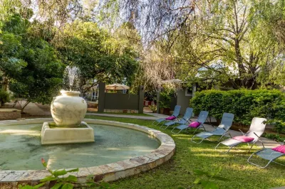 Village Boutique Hotel Hotels near Flintstone Creations
