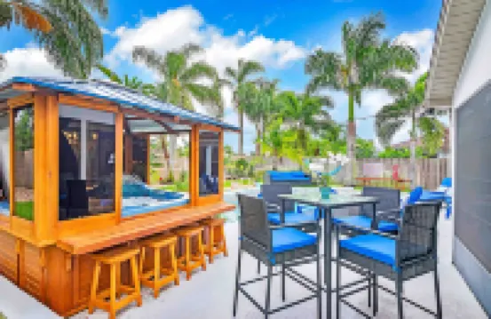 Urban Oasis W/Hot Tub, Heated Pool and Private Movie Theater 2 Bedroom Home by RedAwning