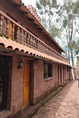 Posadas del Castillo del Titicaca Отели в г. Tililaca