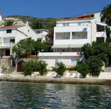 Villa Vedran apartment Vedran B with sun beds facing the sea
