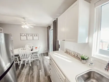 Beautiful newly refinished Home with easy access to Lethbridge with lake close.