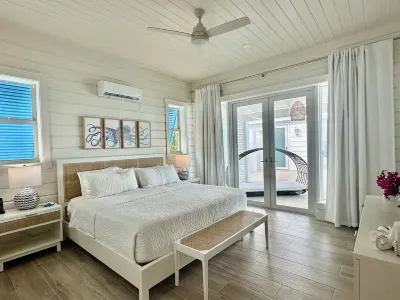 "Luxury beachfront paradise with incredible blue vistas!