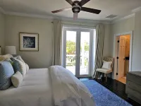 Luxury Beach side escape, steps from private beach, restaurant, marina, and café