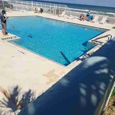 Come chill with us.  Enjoy this cozy condo with beach access and a pool. Fitness & Recreational Facilities