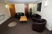 Cocoon @ International Inn + Apartments