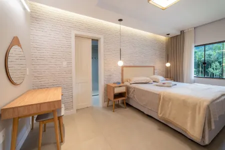 Casa de Campo Aconchegante com Muitas Comodidades na Estrada Bonita Отели в г. Pirabeiraba