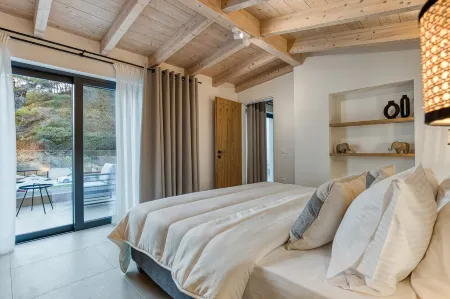 Enjoy a private swimming pool & a barbecue station just 2 steps from the beach.