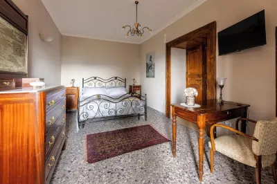 A village that preserves memory. A place to inhabit, not just to visit. 阿爾沃湖附近的飯店