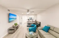 Vanderbilt Beach Condo, Bay Views, New Saltwater Pool, Walk to Beach