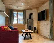 New vacation apartment in the middle of the SkiArena Andermatt Sedrun with indoor golf course