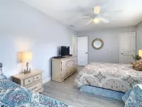 Shovel Sand Not Snow! On the Barrier Island of Indian Shores Florida Hotels near Seaside Seabird Sanctuary