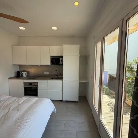 Luxury, self contained, airconditioned studio with private terrace & use of pool