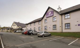 "a large , modern building with a sign that reads "" premier inn "" prominently displayed on the front of the building" at Premier Inn Bangor (Gwynedd, North Wales)