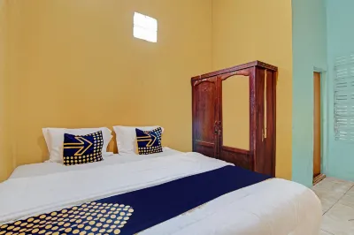 SPOT ON 92716 Penginapan Syafira Near Perumahan Mustamindo Permai 1 Hotel dekat Ori 999 Swalayan