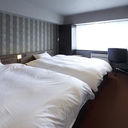 Business Hotel Takara Отели рядом с достопримечательностью «Железнодорожный вокзал Кусацу»