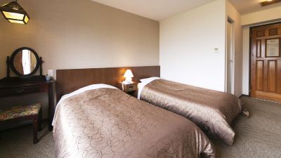 ノースアルプスサイドツインルーム 白馬ハイランドホテルの写真