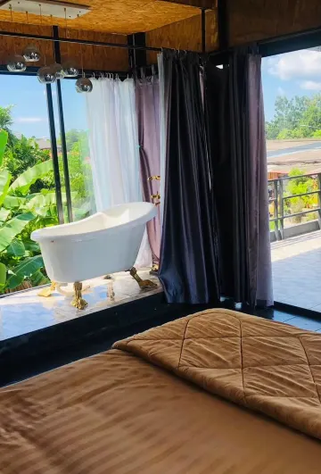 ห้องดีลักซ์ที่มีลานระเบียง