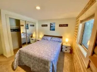 Lakefront cabin with dock, hot tub, fire pit!!