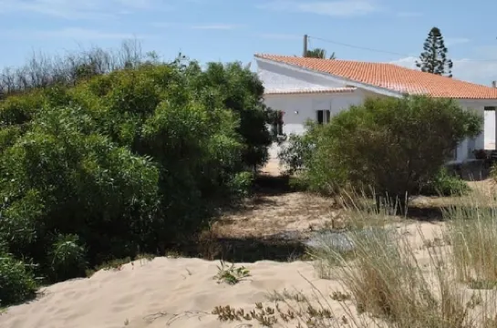 Villa at 20 m. from the sea on the beautiful and unspoiled beach of Carratois