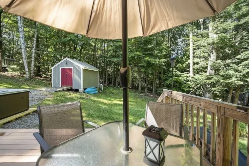 Cozy cottage with private HOT TUB, lake access, Gunstock mountain & fire pit