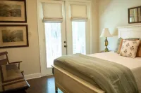 Elegant WATERFRONT home with private boat ramp/dock, elevator, & unmatched view!