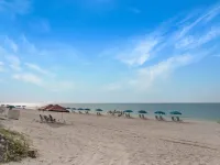 Coastal beach cottage steps away from the white sand beaches!