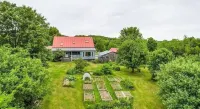 Hill top home located on 30 acres with privacy and surrounding natural beauty.