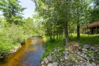 Tranquil cabin on the Pine River