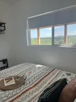 Unique Shipping Container Home with River View near Eureka Springs