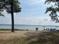 Enjoy views of beautiful Houghton Lake in charming LARGE home that sleeps 10.