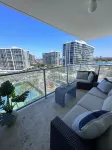 Beach and city views in condo with backyard access to beach and walkable town.