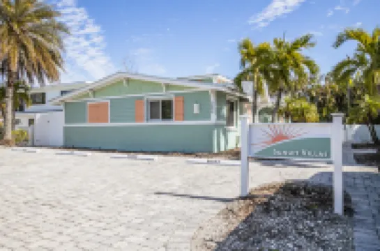 Tropical Flair and Pool Oasis - Charming Beach Getaway