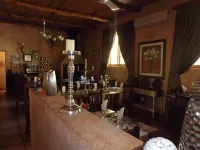 โรงแรม Old Mill Lodge, โรงงานฟาร์มออสทริช & ร้านอาหาร, Oudtshoorn - ที่มีบาร์