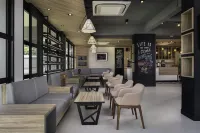 R Photo Hotel Hôtels à : Mueang Nakhon Phanom