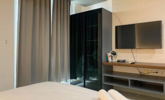 Modern and Comfort Design Studio Room at West Vista Apartment - Housity