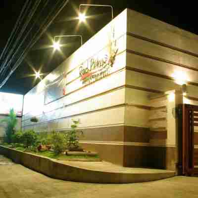 The Red Palm Suites and Restaurant Hotel Exterior