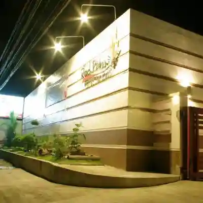 The Red Palm Suites and Restaurant Hotel Exterior