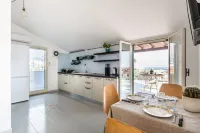 Artemide: Mansarda Vista Mare