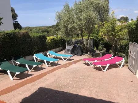 3 Bed Ground Floor Apartment - Sole use of Private Pool & Garden - Cala Galdana Отели в г. Менорка