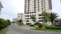 Cozy Living and Tidy 2Br at Puncak Dharmahusada Apartment Hotels in Tambaksari