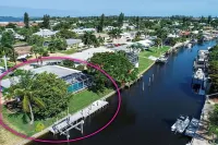 Canalfront Retreat! 2BR + Bunk Nook, Pool & Boat Dock – Easy Water Access!