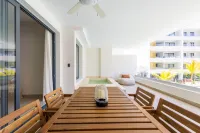 Chic 2BR Stay w Terrace Picuzzi 5 Min to Beach