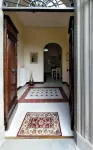 Historic house with garden in front of the Grotta Giusti Thermal pool near Lucca