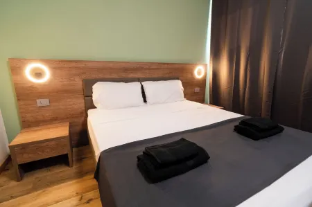 Elysium Self Check-In Rooms Отели в г. Треццо-суль-Адда