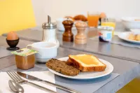 貝桑松城市舒適公寓飯店 - 早餐