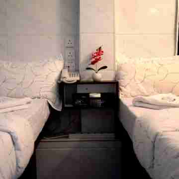 Kowloon TST Guest House Rooms