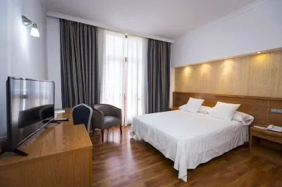Hotel Rusadir Hotels near Floristería Paco